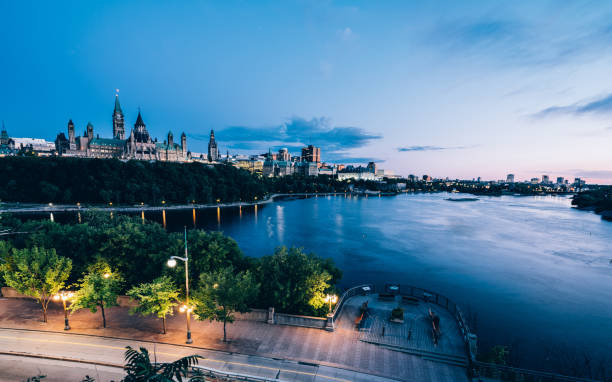 istock Canadian Parliament on Ottawa River with fireworks 1168631584