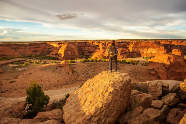 istock A hiker in the Canyon de Chelly National Monument 1168635396