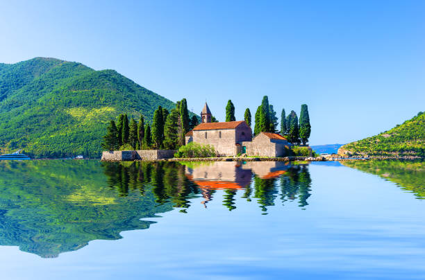 Saint George island St. George island or Island of Dead in Kotor Bay near Perast, Montenegro montenegro stock pictures, royalty-free photos & images