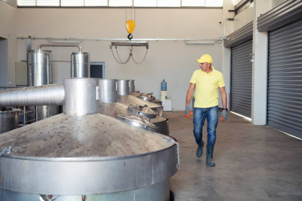 istock Adult man working in distillery 1168636170