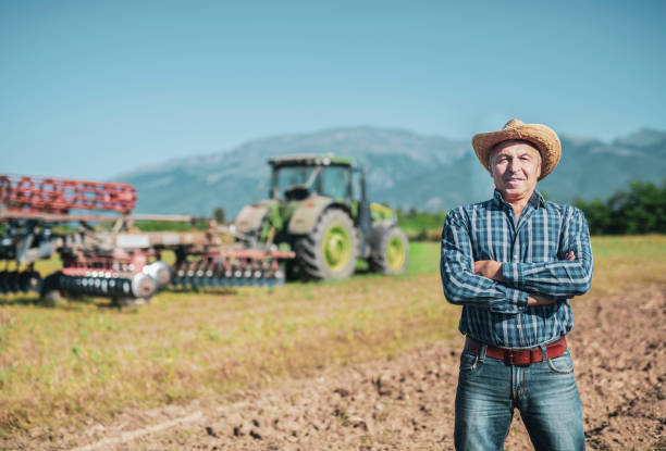 istock Smiling portrait of senior farmer. 1168637496