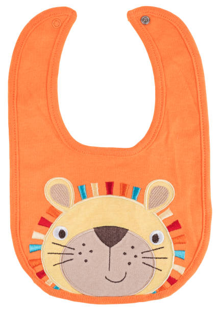 istock Orange baby bib with lion isolated 1168640878