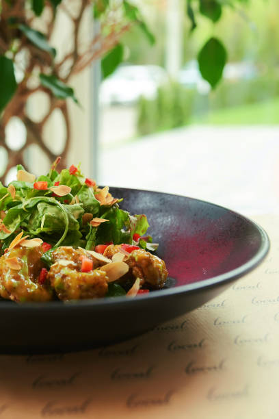 istock Shrimp in batter wasabi on a black plate delicious dish 1168641056