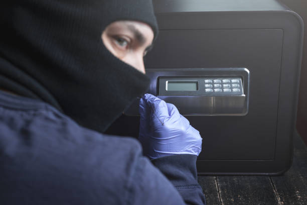 Robber stealing piggy bank