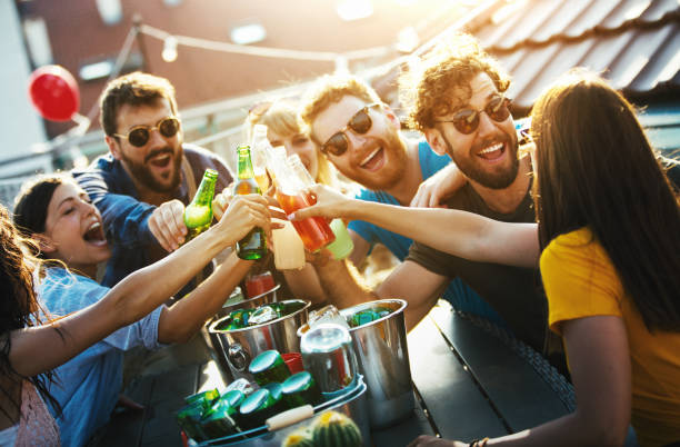 istock Rooftop party on a summer afternoon. 1168642886