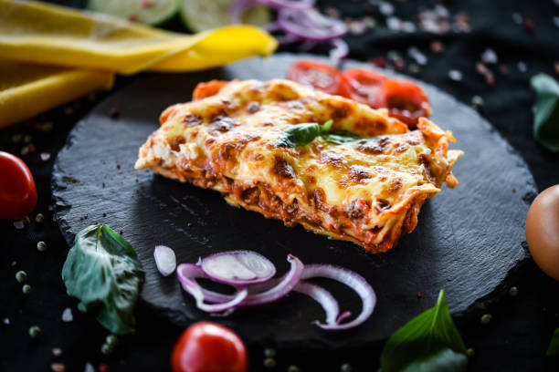 istock italian lasagna slice with fresh ingredients 1168643115