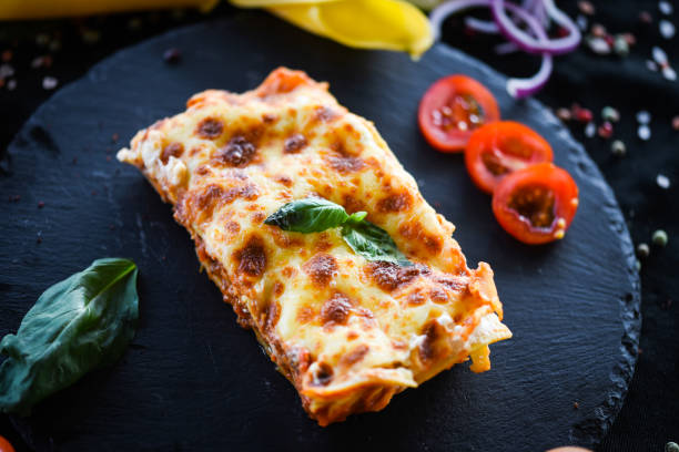 istock italian lasagna slice with fresh ingredients 1168643116
