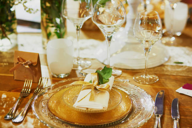 istock Beautiful table set with candles and flowers 1168645380