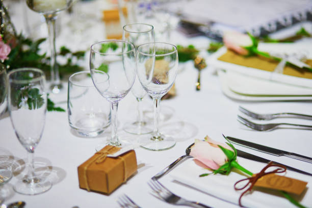 istock Beautiful table set with candles and flowers 1168645383