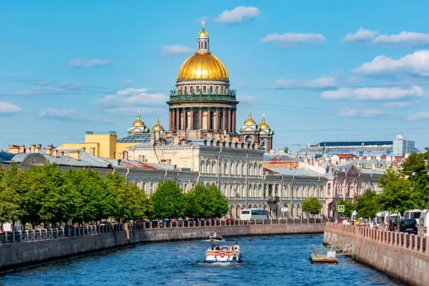 Photo of St. Isaac's Cathedral dome and Moyka river, Saint Petersburg, Russia
