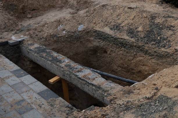 istock deep excavation near the foot path, part of construction work 1168650369