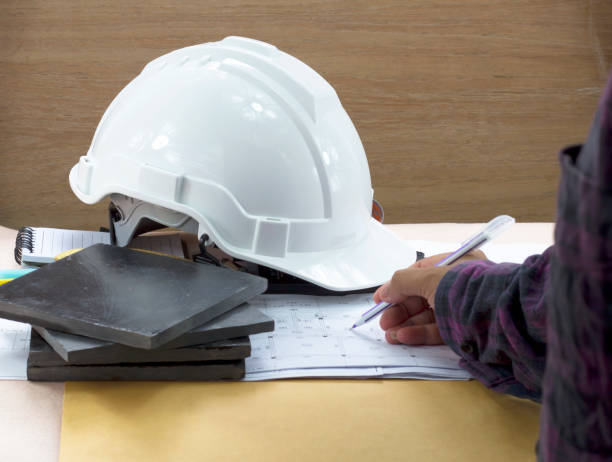 istock Engineers are drawing the construction drawings in the office. 1168652665