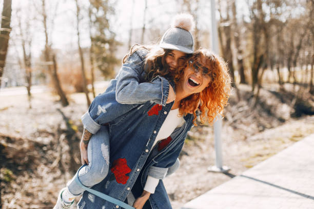 istock Elegant mother with daughter in a summer park 1168656902
