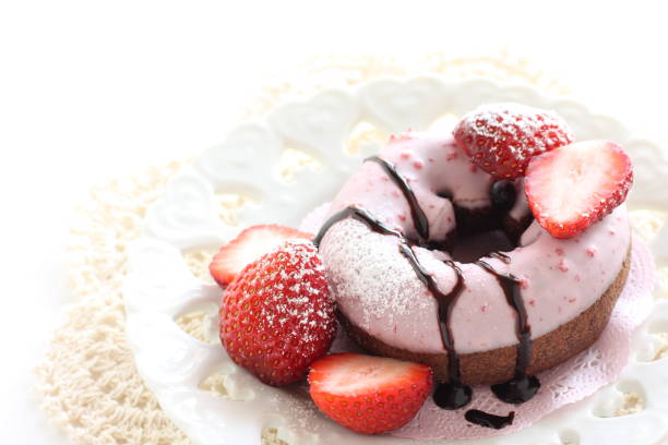 istock strawberry and donut on dish 1168657087