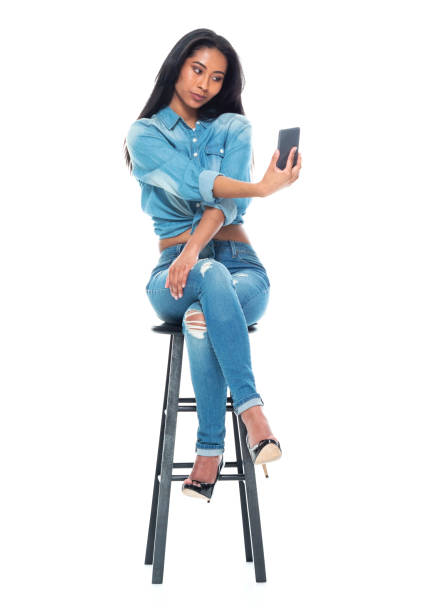 istock Beautiful latino female wearing double denim 1168658319