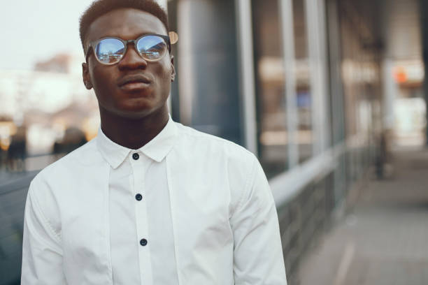 istock Elegant black man in a summer city 1168660012