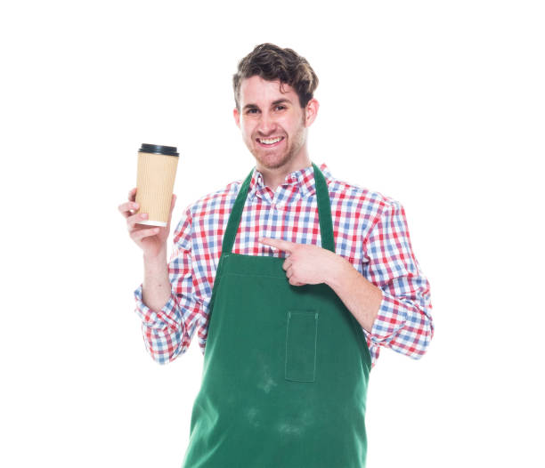 istock Happy man holding a cup of coffee 1168660056