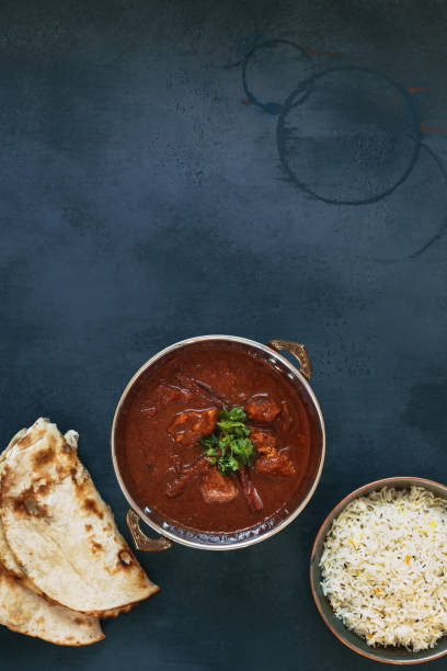 istock Kashmiri Lamb Rogan Josh, aromatic lamb curry in traditional serving bowl 1168661353