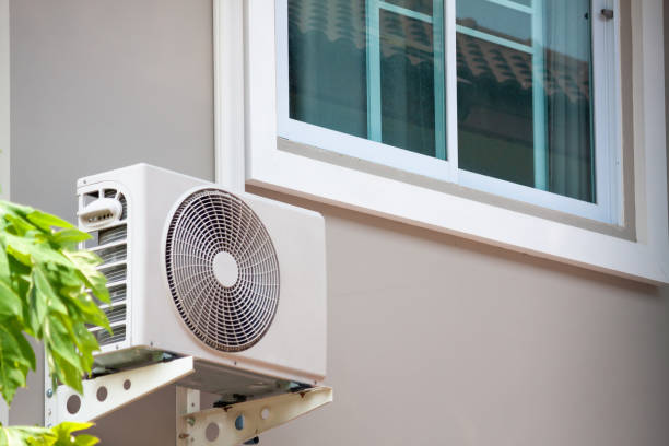 istock Air conditioner compressor outdoor unit installed outside the house 1168661399