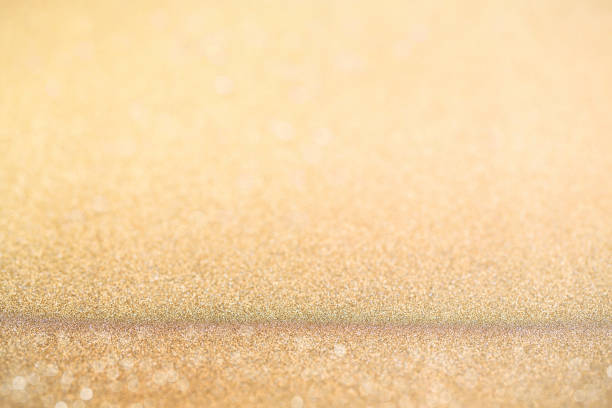 istock Abstract blur gold glitter christmas event celebration card design background concept - shiny light dust sparkle festive decoration effect, smooth holiday texture golden wallpaper, happy new year 2019 1168662226