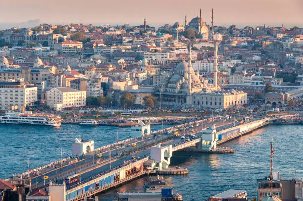 Beautiful sunset aerial cityscape of Istanbul historic centre with Galata bridge and mosques. Istanbul, Turkey
