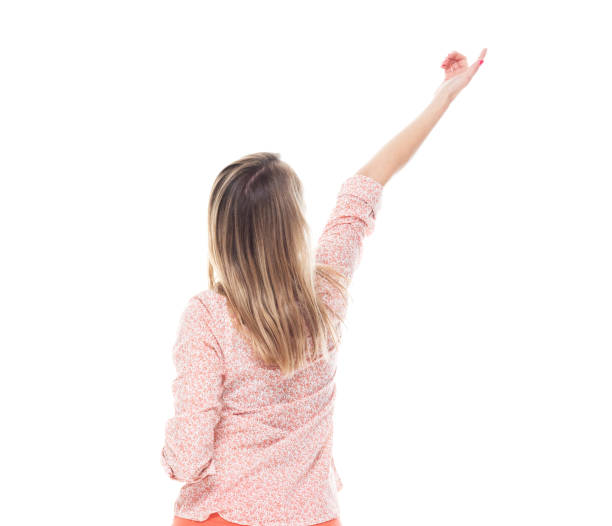 istock Beautiful female showing / pointing 1168662982