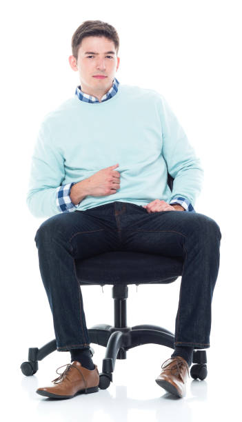 istock Handsome young man sitting and feeling serious 1168665668