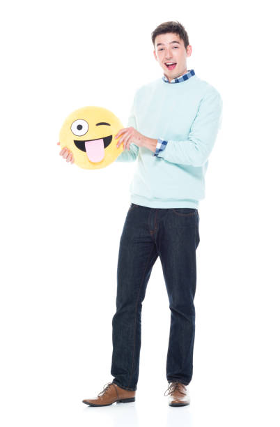 istock Attractive man holding an emoji face 1168666236