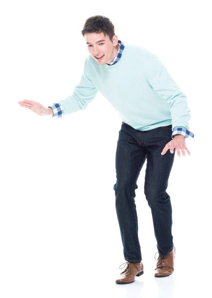 istock Handsome young man walking carefully / tip toe 1168666278