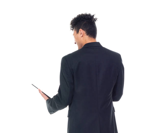 istock Good looking African American businessman - using tablet 1168666444