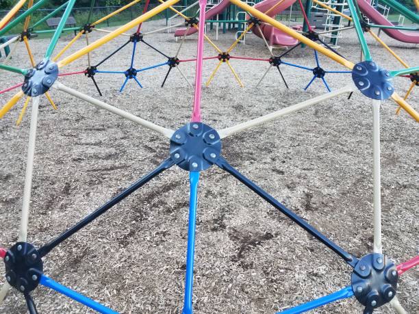 istock colorful metal jungle gym with triangles on playground 1168667376