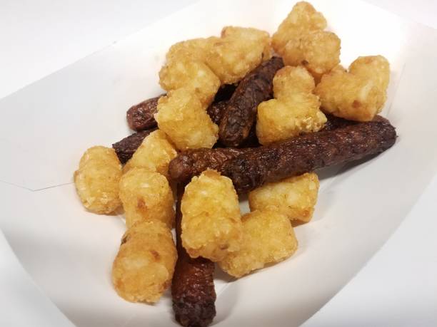 istock turkey sausage and tater tots in white container on table 1168668212