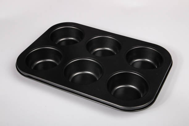 istock Stainless cupcake mold tray on the white background 1168670584