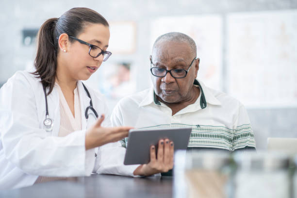 istock Doctor uses a tablet during a medical consultation 1168671393