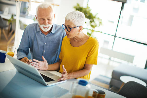 istock Mature couple messaging their children over the internet. 1168675747