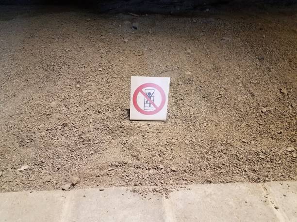 istock no climbing sign on soil and stone in cave 1168679339