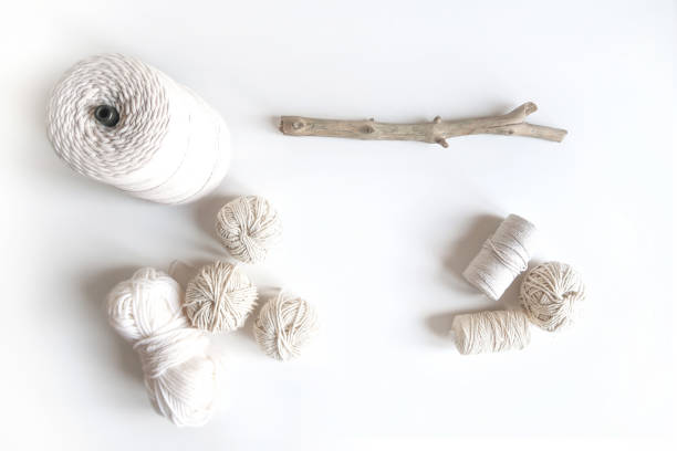 Boho white mockup with cotton yarn on the desk. Top view flat lay. Space for your text stock photo