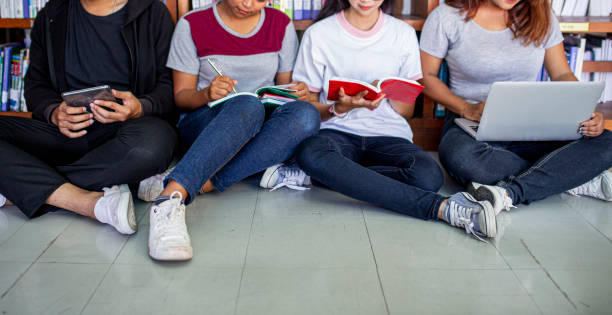 istock Back to school education knowledge college university concept, Students Education Social Media Laptop Tablet. 1168687123