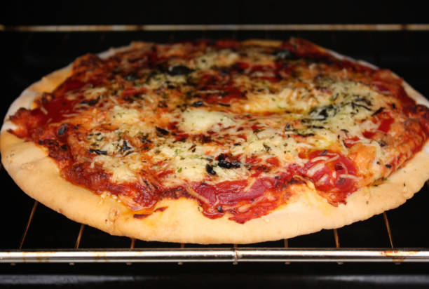 istock Homemade pizza with four cheeses 1168690456