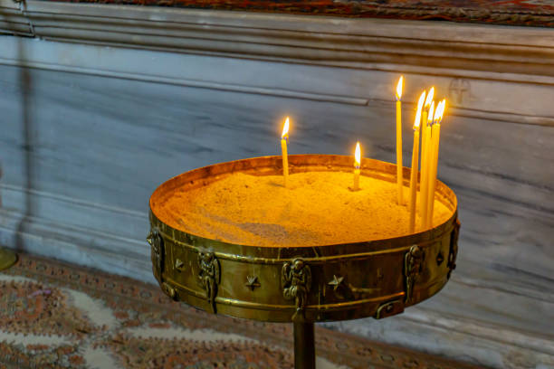 istock Inside a cathedral of catholic church with candles 1168701060