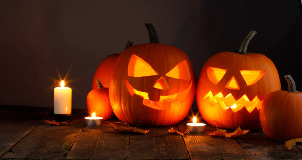 istock Halloween pumpkin and candles 1168711308