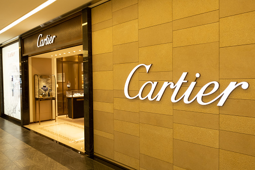 Chiba, Japan - March 24, 2019: View of Cartier front store, French luxury unique collections of fine jewelry, watches, bridal sets, accessories and fragrances, at Narita International Airport, Chiba.