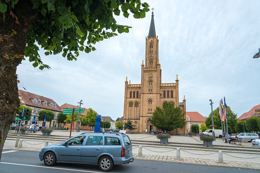 Fürstenberg, Germany - August 05. 2019 - The town church in Fürstenberg Havel stands on the market square and is an impressive building. Fürstenberg is known for its location in the middle of lakes and is therefore also known as a water city. In the city you can see many inhabitants and tourists
