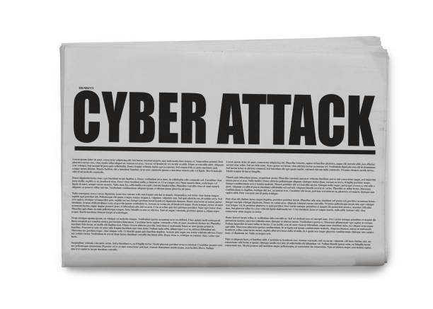 istock Cyber attack written headlined newspaper isolated on a white background. 1168723894