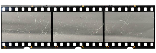 long 35mm filmstrip with cool texture Film strip template with three blank or empty frames, developed 135 type or 35mm film material photo placeholder on white, real film grain 35mm movie camera stock pictures, royalty-free photos & images