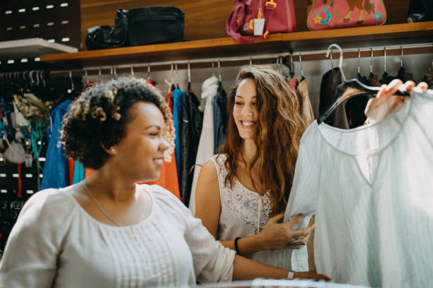 istock Young women vintage clothes shopping 1168725747