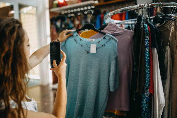 istock Young women vintage clothes shopping 1168729403
