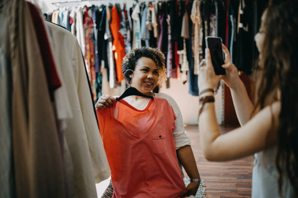 istock Young women vintage clothes shopping 1168729435