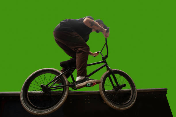 istock BMX rider on green screen. 1168730358