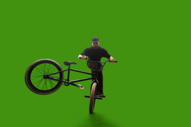 istock BMX rider on green screen. 1168730392